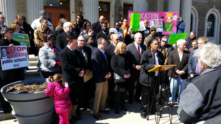 Pols rally for education reform