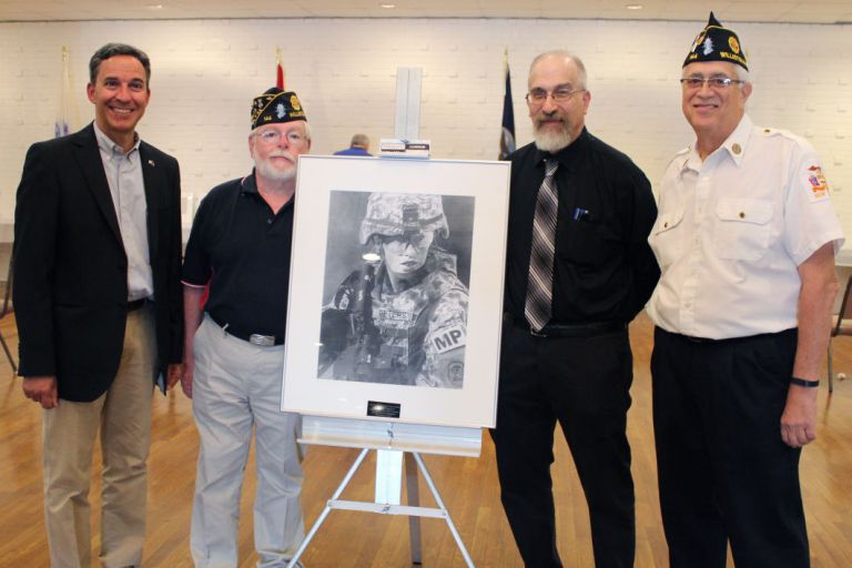 American Legion post holds auction to raise funds for roof repairs