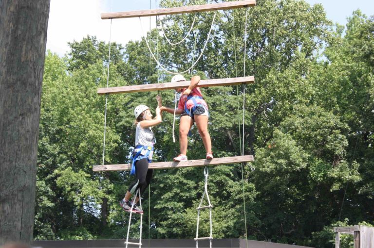 New Herricks teachers climb ropes to raise game