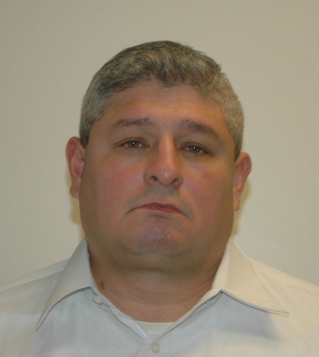 Hempstead Village policer officer who lives in Roslyn Heights indicted for allegedly sexually abusing a woman in front of her children