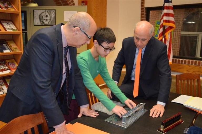 Middle schoolers present science projects at the Education Board Meeting