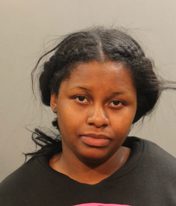 Queens woman stole from NHP bank: cops