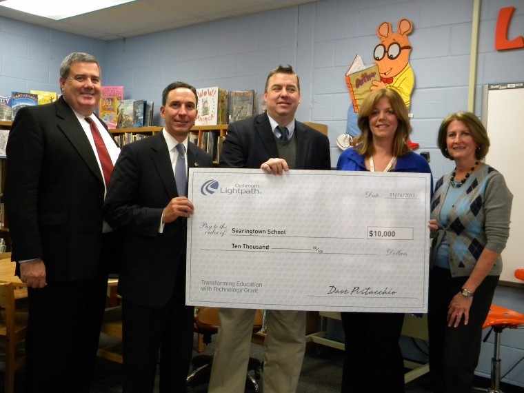 Librarian brings gift to Searingtown