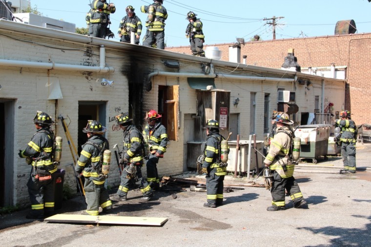 Lit cigarette ignites fire at hair salon