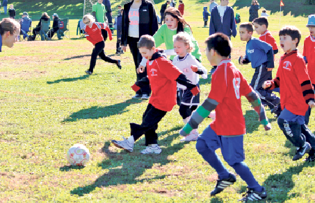 OP Soccer players shine on sunny day