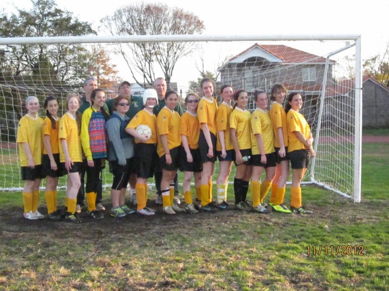 St. Aidan soccer team aids Long Beach St. Aidan soccer team aids Long Beach