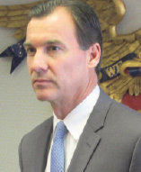 Suozzi touts record, hits Mangano