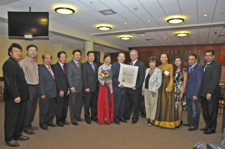 Mangano honors Asian NHP resident
