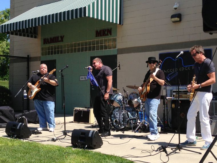 East Hills band rocks pool opening