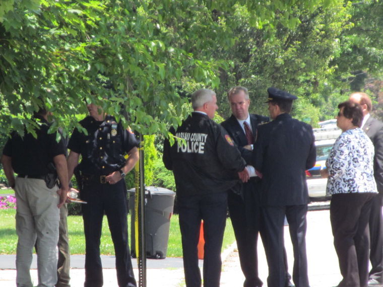 Man with gun shot by Nassau police