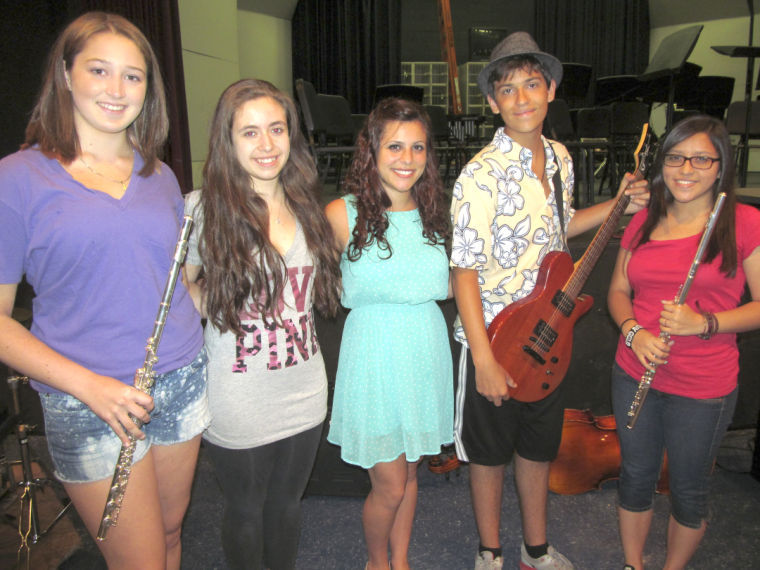 Herricks teaches music, teaching