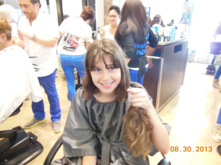 Girl donates hair for cancer wigs Girl donates hair for cancer wigs
