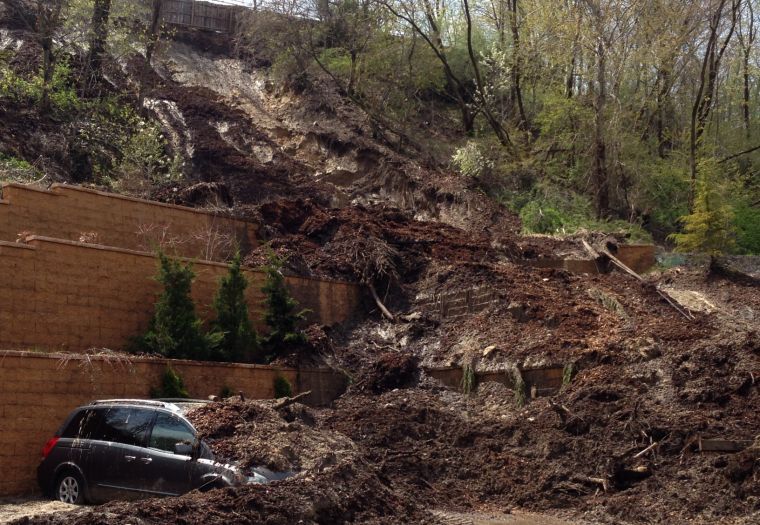 Autos buried by Port Washington mudslide Autos buried by Port Washington mudslide