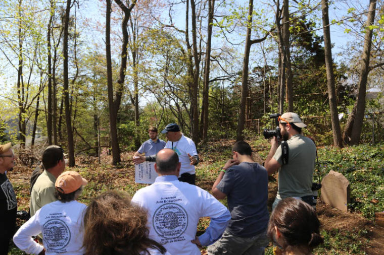 Garbage, debris cleared from historic cemetery