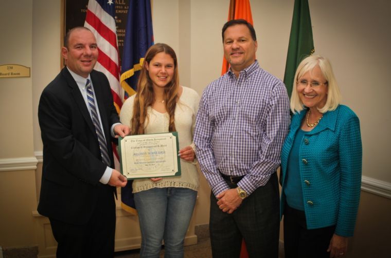 Schneider receives honor at Town Hall