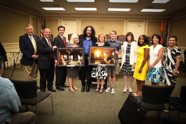 Town board honors Roslyn Hgts. artist