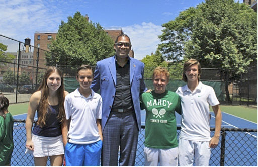 Manhasset tennis player Holweger awarded for racket donations, skills clinic Manhasset tennis player Holweger awarded for racket donations, skills clinic