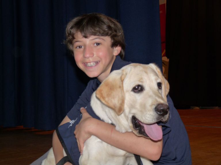 Schechter sixth graders foster guide dogs for Israel