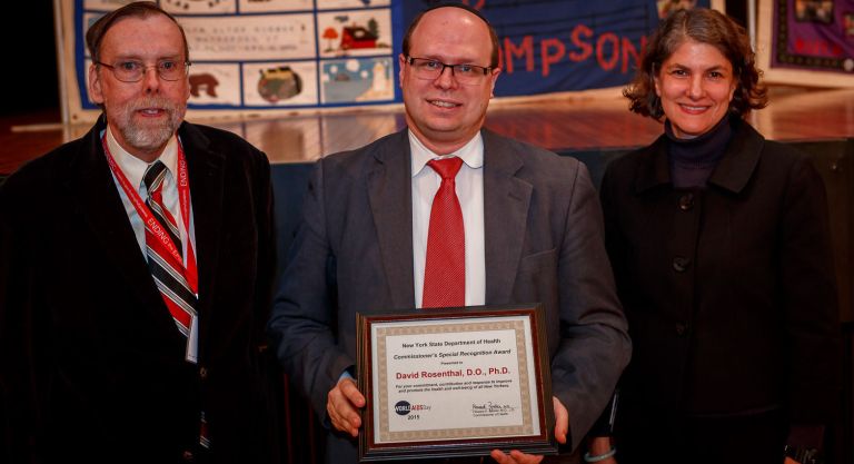 Great Neck-based doctor receives state health award at AIDS Day ceremony Great Neck-based doctor receives state health award at AIDS Day ceremony