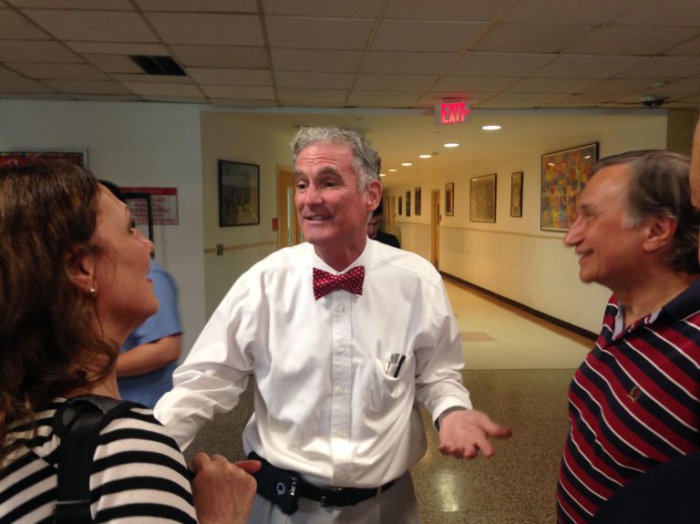 With settlement approved, East Williston teacher returns to classroom