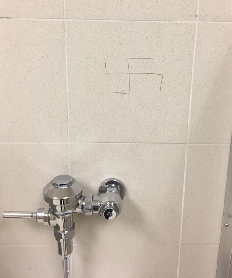 Student finds swastika on bathroom wall at Schreiber High School