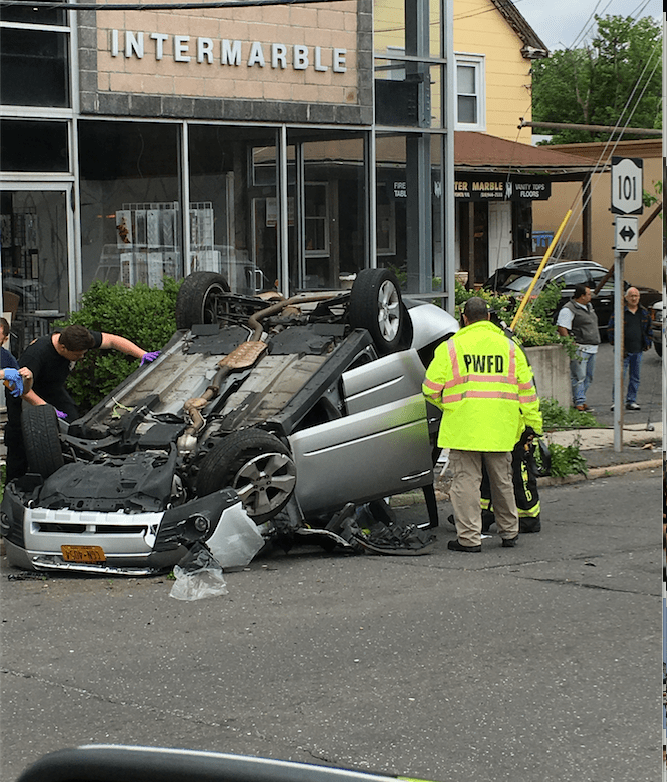 Fire department extracts man from car after crash in Port