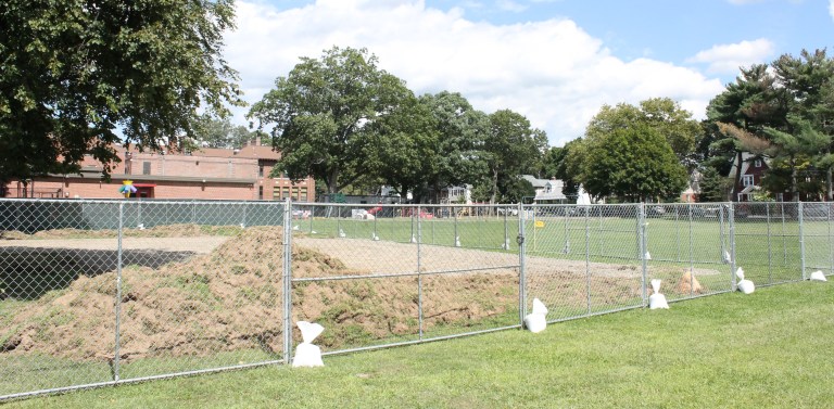 Heights School parents, neighbors challenge temporary parking lot Heights School parents, neighbors challenge temporary parking lot