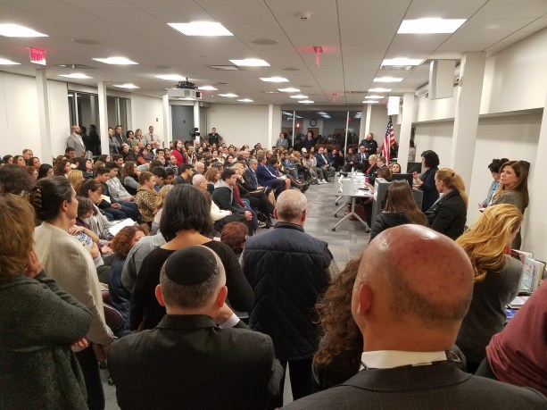 Maria Elisa Cuadra-Fernández, the CEO of Great Neck-based COPAY Inc., spoke before a room crowded by parents, children, administrators, officials and other curious community members who asked questions about drug addiction and mental health late last year. (Photo by Janelle Clausen)