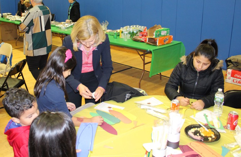 Phillips attends Manhasset/G.N. EOC.’S Thanksgiving dinner