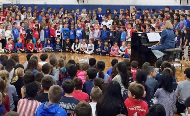 Harbor Hill students honor veterans with performance Harbor Hill students honor veterans with performance