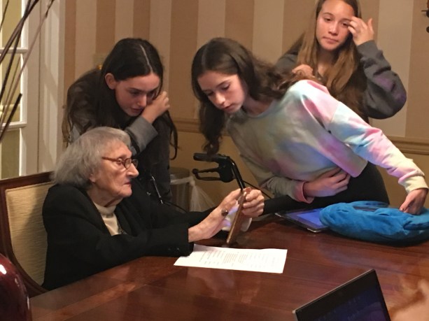 Teens involved in the Lake Success Chabad's Cyber Seniors program showed senior citizens at the Atria how to use new technology. (Photo courtesy of Lake Success Chabad)