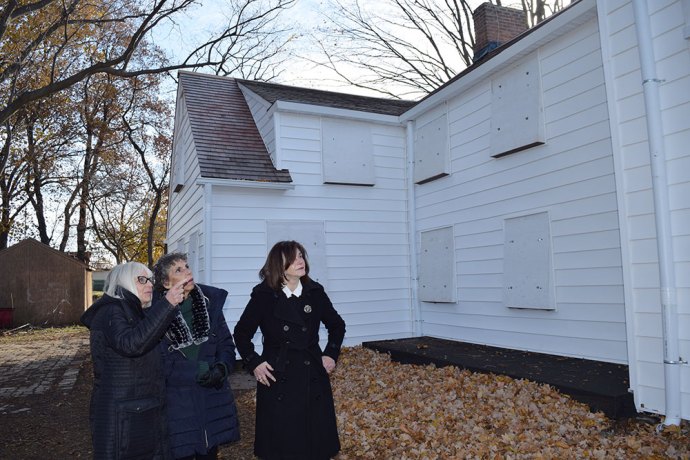 Supervisor Judi Bosworth, Marianna Wolgemuth, member of the New Hyde Park District Advisory Committee, and Council Member Lee Seeeman look over the improvements made to the Schumacher House. (Photo courtesy of the Town of North Hempstead)