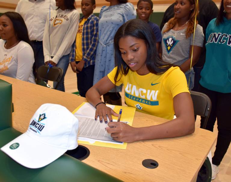 Elmont Memorial seniors sign National Letters of Intent