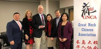 The Great Neck Chinese Association honored Lawrence Gross, a former trustee of the Great Neck Board of Education, with an award for lifetime achievement on Monday. (Photo courtesy of the Great Neck Chinese Association)