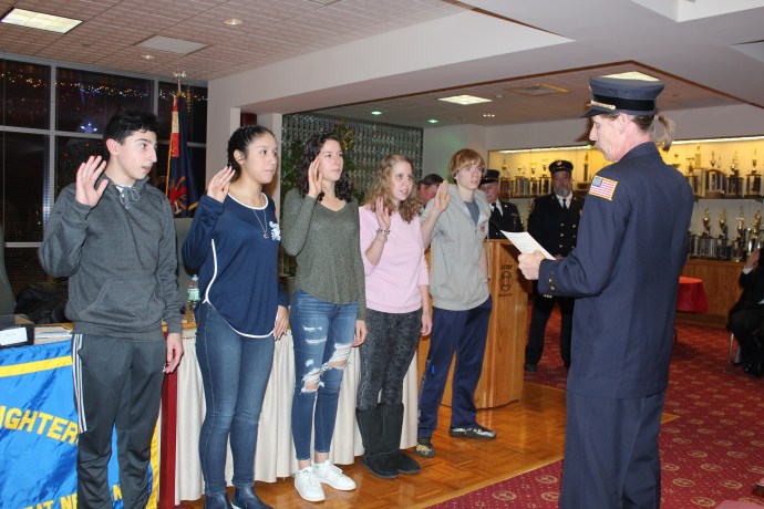 Financial Secretary Ethan Moezinia; Recording Secretary Niki Talledo; 2nd Lieutenant Maya Garfinkel; 1st Lieutenant Julia Motchkavitz; Captain Seth Newman. Alert Chief Steve Schwartz swore in the new officers. (Photo courtesy of Great Neck Alert Fire Company)