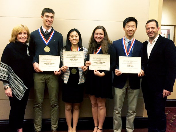 Outstanding Physical Education Award winners Gabriel Lefkowitz, Glory Chung, Jessica Rothstein and Kevin Li are joined by Tara Casey-Rosenthal, physical education teacher at South High, and Eamonn Flood, athletic director and physical education department chair at North High, during the Nassau Zone awards banquet on Dec. 11. (Photo courtesy of Great Neck Public Schools)