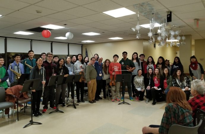 The music department at South High School visited Northwell Health Stern Family Center to sing for patients. (Photo courtesy of the Great Neck Public Schools)