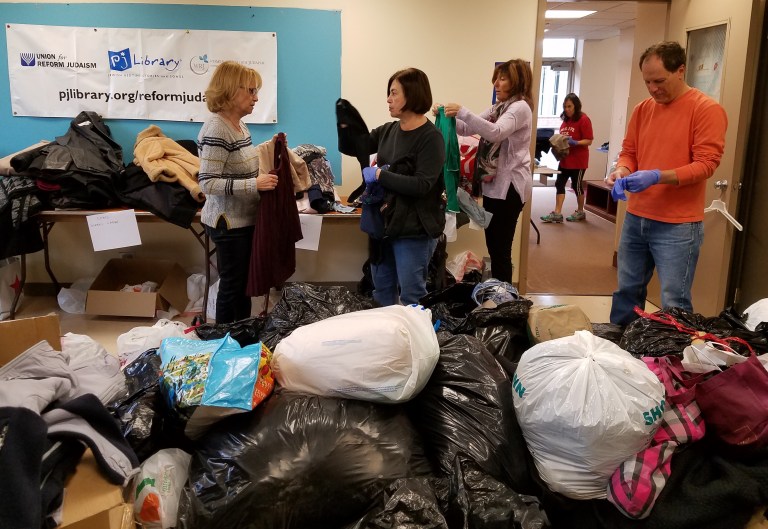 Temple Judea collects coats, blankets for needy Temple Judea collects coats, blankets for needy