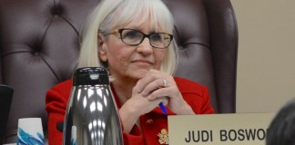 Town of North Hempstead Supervisor Judi Bosworth listens as a resident speaks at a town board meeting. (Photo by Janelle Clausen)