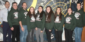 North High Regeneron Scholars Natasha Dilamani, Megan Xu and Amy Shteyman are joined by Principal Daniel Holtzman and science research teachers Alan Schorn, Christopher Bambino, Christina Keys and Maya Lerner, and Science Department Chair Jessica Schust. (Photo courtesy of the Great Neck Public Schools)