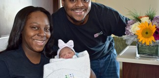 Tamari Gardner, 24, and Aaron Shingler, 25, hold Aziya Dream Shingler, one of the first babies of 2018. (Photo courtesy of Northwell Health)