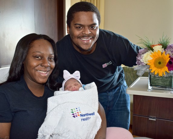 Tamari Gardner, 24, and Aaron Shingler, 25, hold Aziya Dream Shingler, one of the first babies of 2018. (Photo courtesy of Northwell Health)