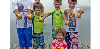 The cover of "Grandma Poems - Not Too Sweet" by Carolyn Raphael, which features her five grandchildren holding lemons, alludes to the sweet, but not too sweet theme of the book. (Photo courtesy of Carolyn Raphael)