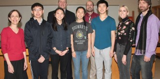 South High Regeneron Scholars Eric Kuang, Michelle Xing, Cindy Wang and Daniel Kim are joined by science research teacher Dr. Carol Hersh, Principal Dr. Christopher Gitz, Science Department Chair Bradley Krauz, and science research teachers Nicole Spanelli and Dr. James Truglio. (Photo courtesy of the Great Neck Public Schools)