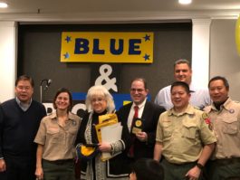 Nathan Fong, Pack Committee Chairman, Julienne Kawai, Arrow of Light Den Leader, Barbara Berkowitz, school board president, Rabbi Daniel Schweber of Temple Israel, Cubmaster David Lau, incoming Cubmaster Lee Korn, and Tiger Den Leader Joeming Woolf. (Photo courtesy of Steven Chen)