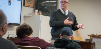 Mark Carter, a vice president of sales at RealTerm Energy, explains the science behind LED lights. (Photo by Janelle Clausen)