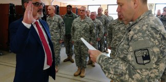 New York Guard Acting Commander Colonel David Warager swears in Robert Duarte of Northwell Health. (Photo by Capt. Mark Getman/New York Guard)