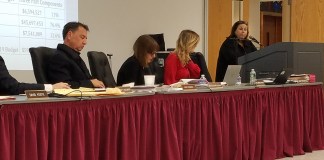 Sydney Freifelder, the assistant superintendent for business, outlines the overall budget before administration heads focus on specific line items. (Photo by Janelle Clausen)