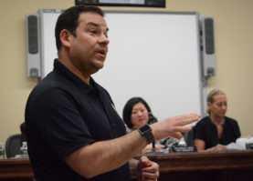 Todd Atkin, a problem oriented police officer, speaks to parents and school officials at a Herricks school board meeting. (Photo by Janelle Clausen)