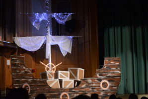 This giant pirate ship, complemented by lights, was one of the many pieces of the stage used for the performance of Peter Pan. (Photo by Janelle Clausen)